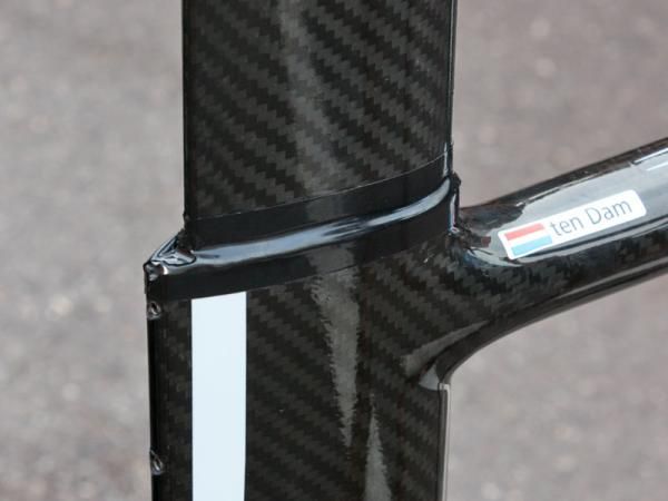These strips of electrical tape will ultimately be replaced with a much neater molded rubber gasket.