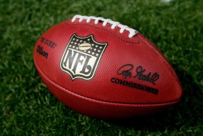 The NFL logo on a football