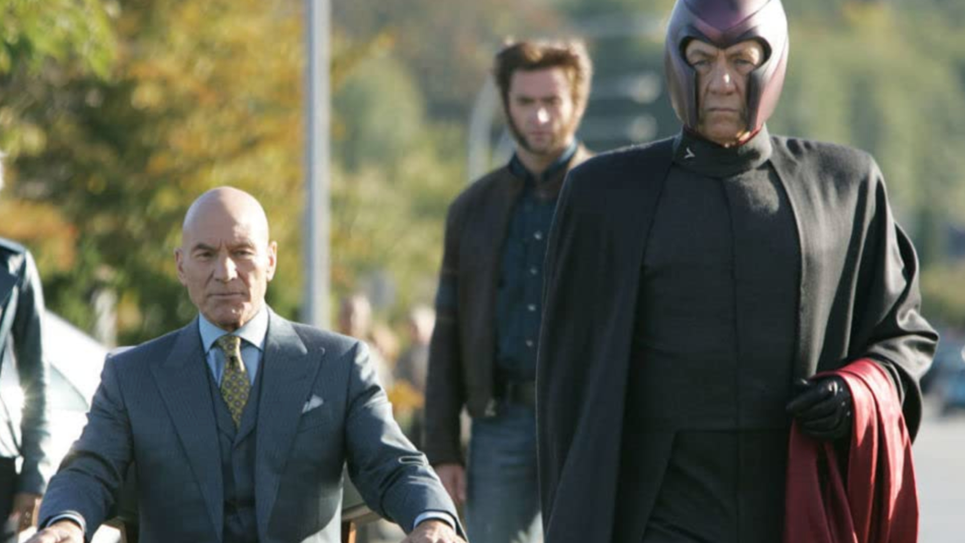 Charles Xavier and Magneto proceeding down a street with Wolverine behind them in one of 20th Century Fox&#039;s live-action X-Men movies