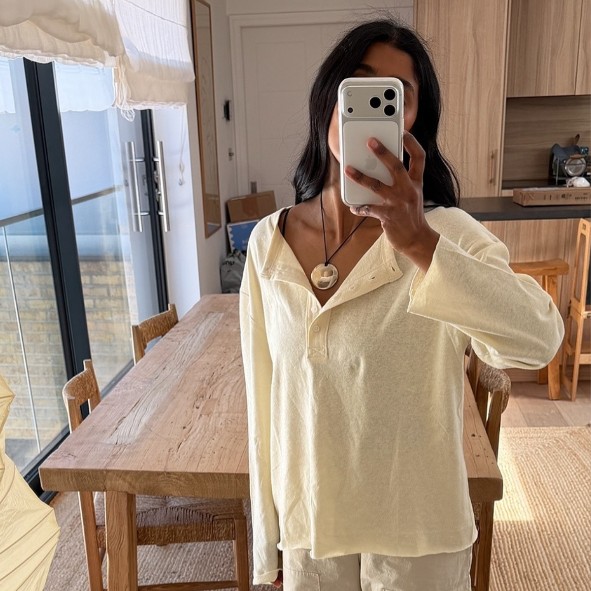 Monikh wears the henley t-shirt trend