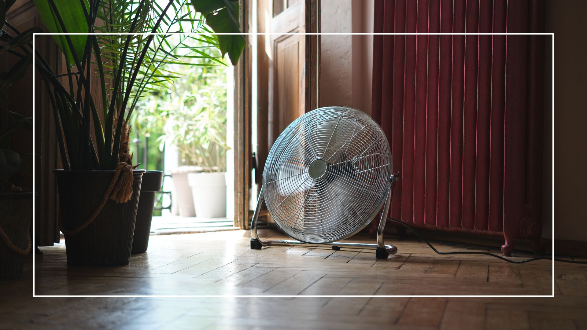 picture of electric floor fan in doorway of home