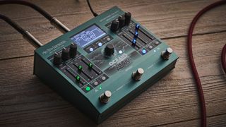 An Electro-Harmonix Oceans Abyss reverb pedal on a wooden floor