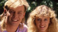 What time is Neighbours on? What you need to know, seen here Kylie Minogue and Jason Donovan on the set of neighbours 