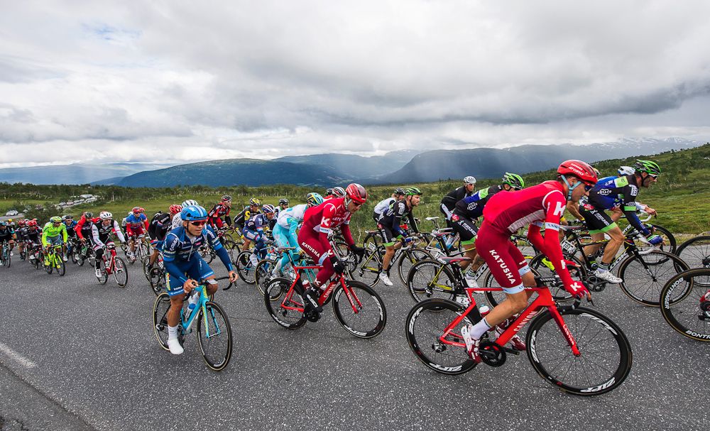 Cyclists ride during the 198,5 km second stage of the Arctic Race of Norway between Mo i Rana and Sandnessjoen