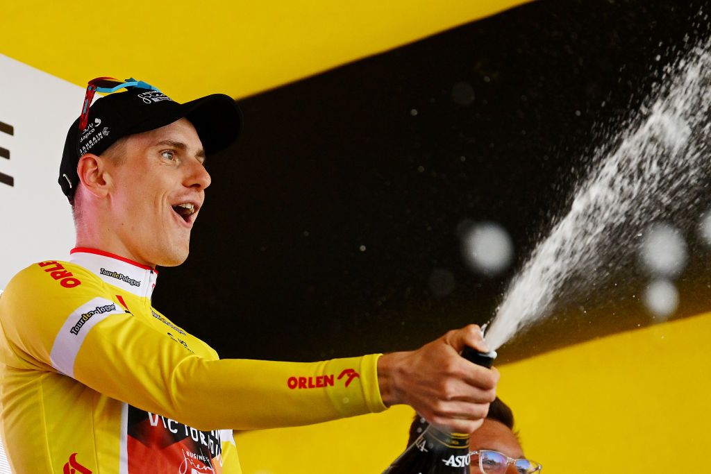 KATOWICE POLAND AUGUST 03 Matej Mohori of Slovenia and Team Bahrain Victorious celebrates at podium as Yellow leader jersey winner during the 80th Tour de Pologne 2023 Stage 6 a 166km individual time trial stage from Katowice to Katowice UCIWT on August 03 2023 in Katowice Poland Photo by Dario BelingheriGetty Images