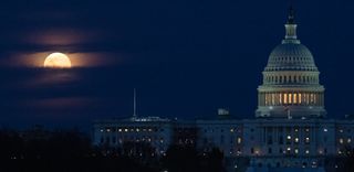 The first supermoon of the year peers through a blanket of clouds above the U.S. Capitol in Washington in this photo captured by NASA photographer Joel Kowsky on Monday (March 9). Also known as the "Worm Moon," the full moon of March nearly coincided with the moon's perigee, or the closest point to Earth in the moon's elliptical orbit. The moon was officially full on Monday at 1:48 p.m. EDT (1748 GMT), at it reached perigee almost 13 hours later, at 2:33 a.m. EDT (0633 GMT) today.