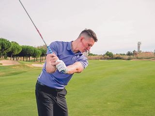 Gary Munro checking his backswing to ensure he is on the correct swing plane