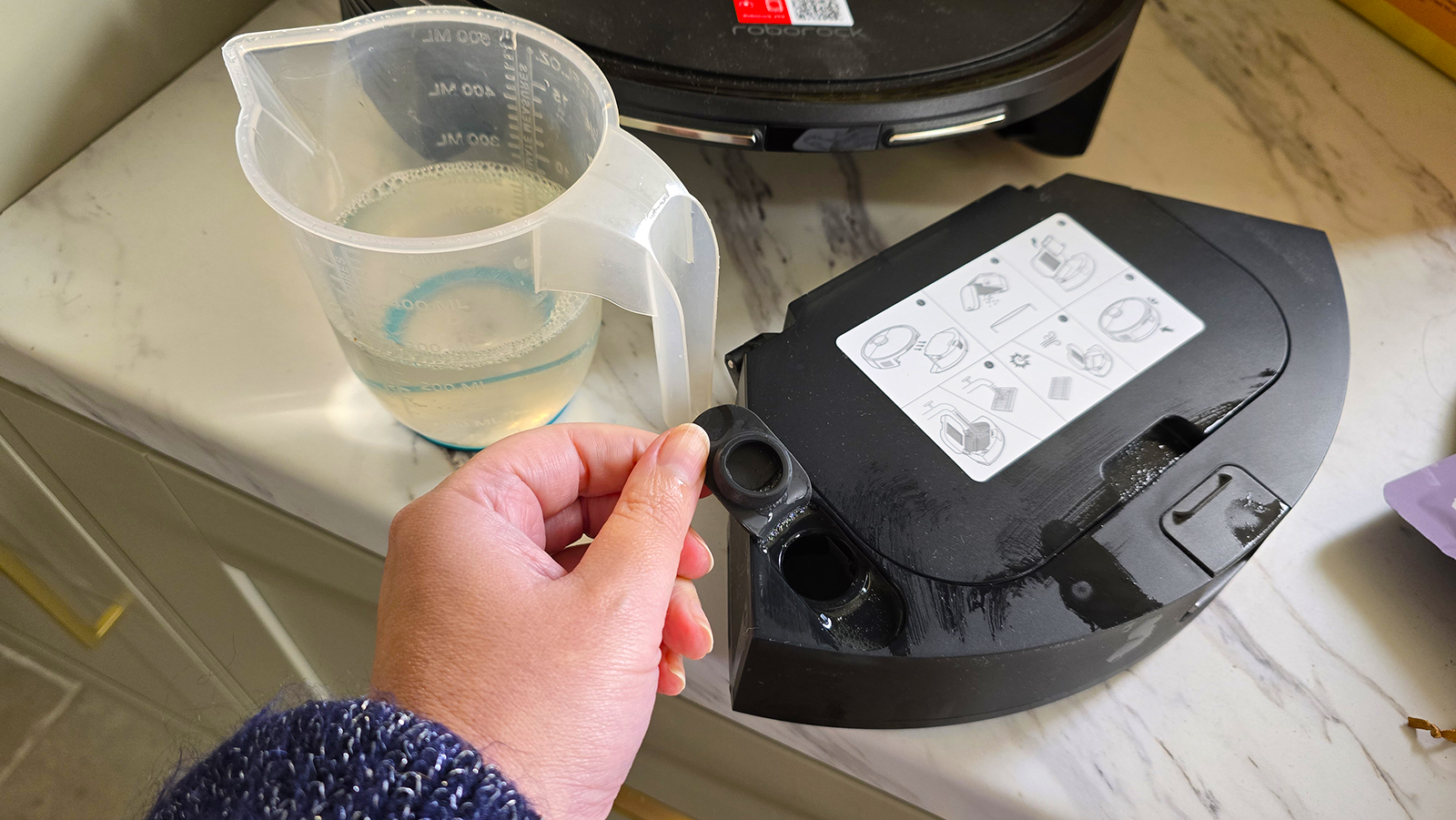 Roborock Q7 M5 robot vacuum filling water tank
