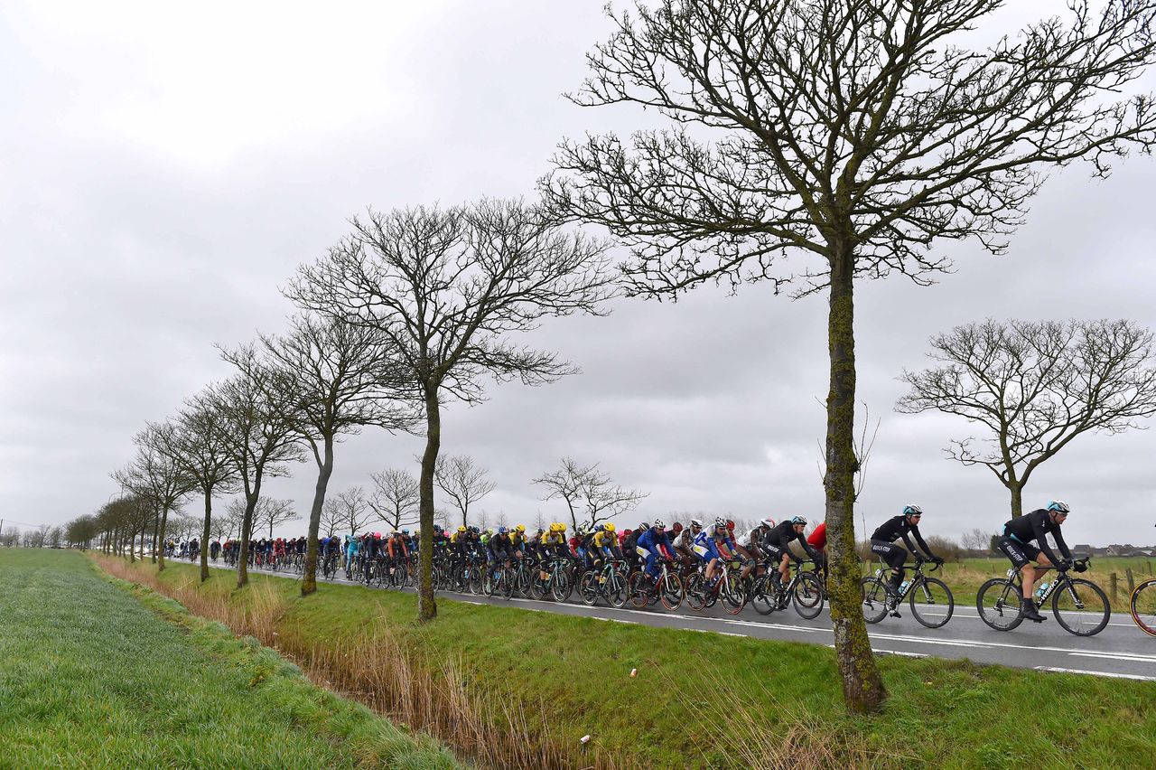 The peloton passes by