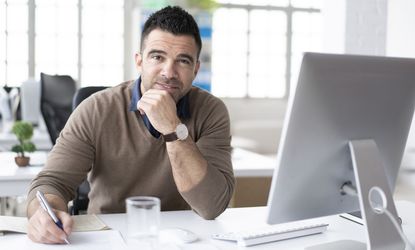 Successuful manager working in modern workplace.