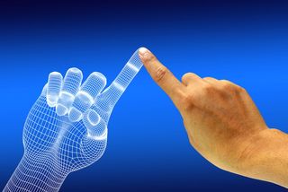 A human hand reaches a finger out to touch a digital hand. 