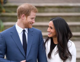 Prince Harry and Meghan Markle attend an official photocall to announce their engagement