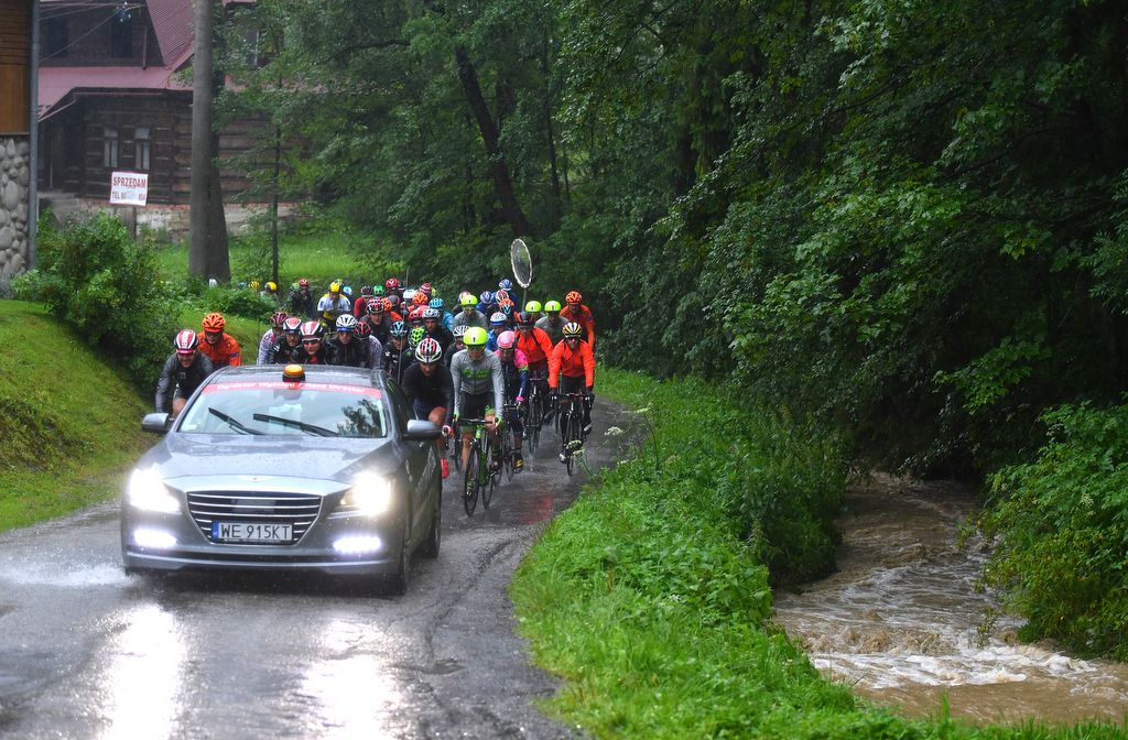 The peloton follows the race directors car during the short moment of racing
