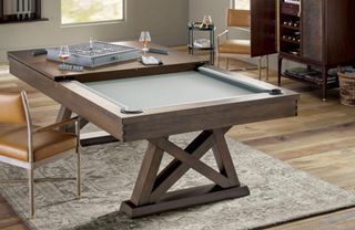 Large dark wooden games table in office