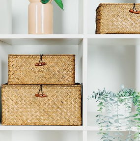 Stackable wicker storage boxes.