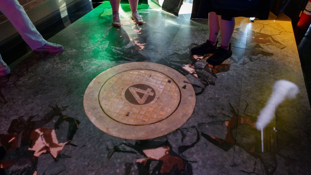 A digital floor displaying a crumpling floor at Google's San Diego Comic-Con Rewards Lab