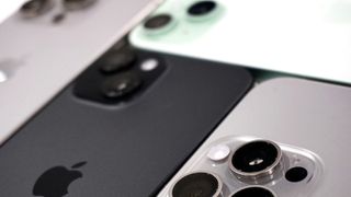 iPhone 15 family back angled closeup – darkened edit