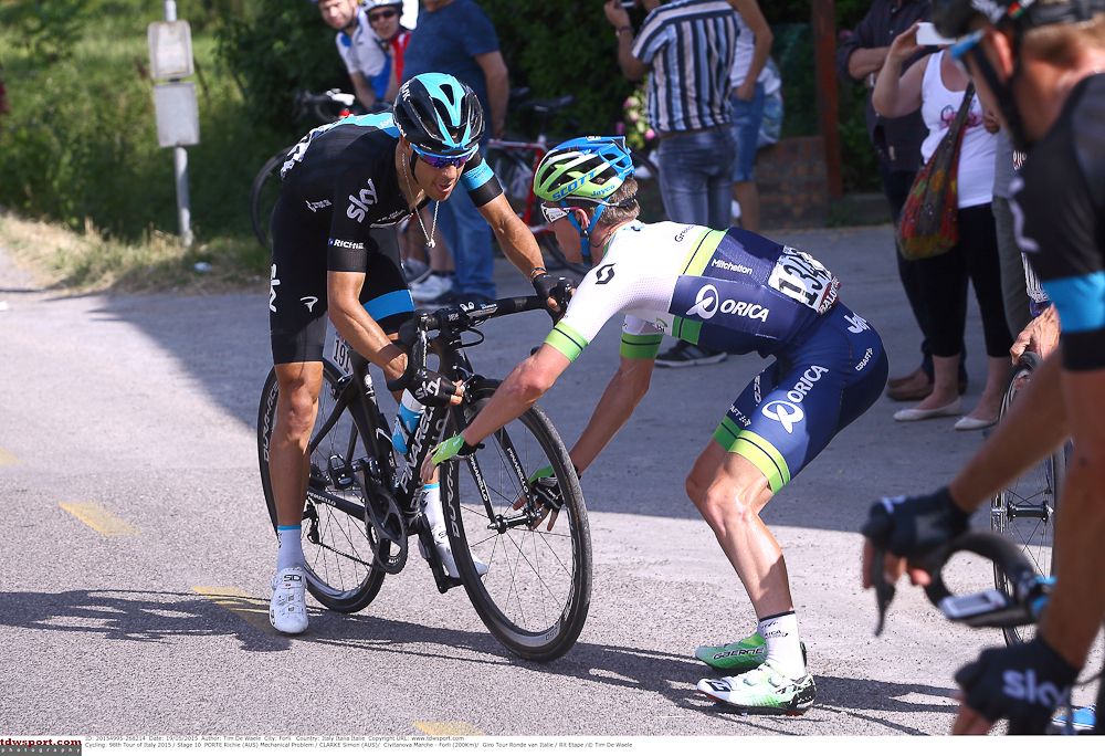 Simon Clarke gives Richie Porte a wheel during stage 10. Porte was later penalised.