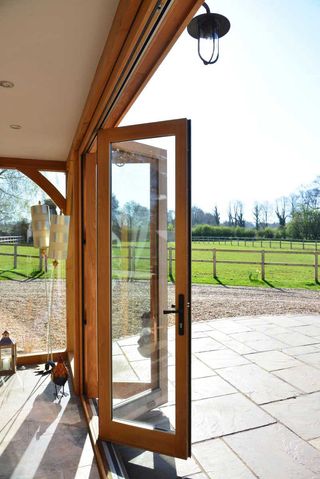 oak bifold patio doors in conservatory