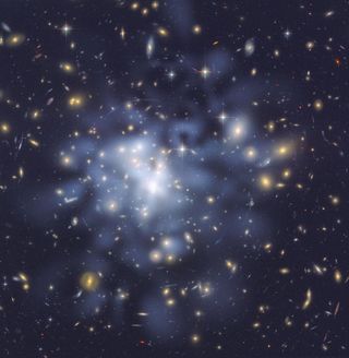 This NASA Hubble Space Telescope image shows the distribution of dark matter in the center of the giant galaxy cluster Abell 1689, containing about 1,000 galaxies and trillions of stars. Dark matter is an invisible form of matter that accounts for most of
