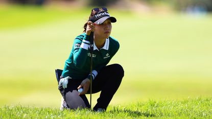 Lydia Ko lines up a putt