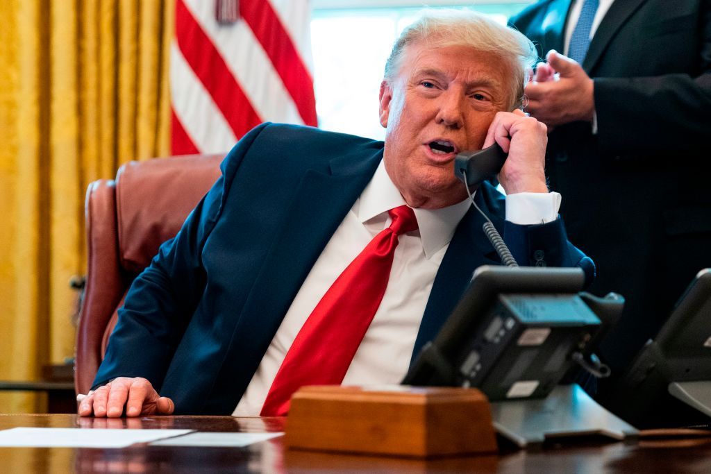 President Donald Trump speaks to the leaders of Sudan and Israel as he announces that Sudan will normalize relations with Israel at the White House in Washington, DC, on October 23, 2020.