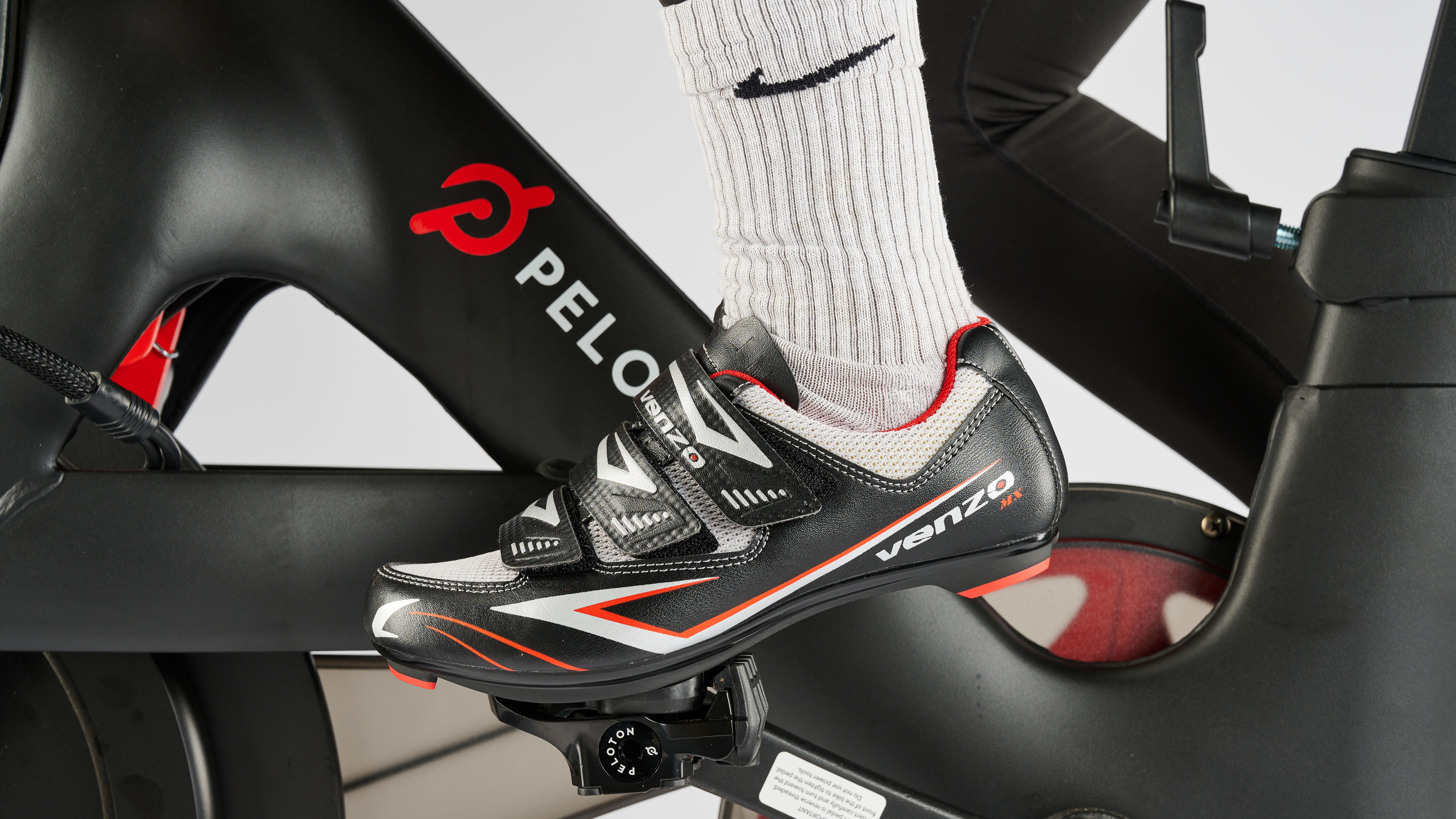 Venzo cycling shoe clipped into Peloton bike