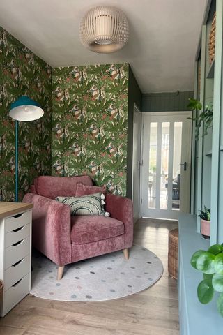 pink and green reading corner with circular rug