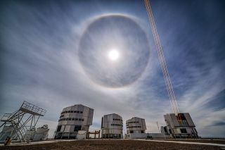 A lunar "halo" glows like an orb in the night sky above the Very Large Telescope in northern Chile, in this photo by European Southern Observatory astronomer Juan Carlos Muñoz-Mateos. This optical phenomenon occurs when moonlight gets refracted by tiny ice crystals and water droplets in the atmosphere.