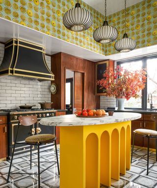Colorful kitchen with yellow kitchen island, wallpaper,