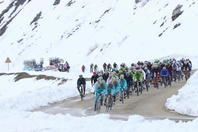 Astana lead the peloton over the first climb of the day