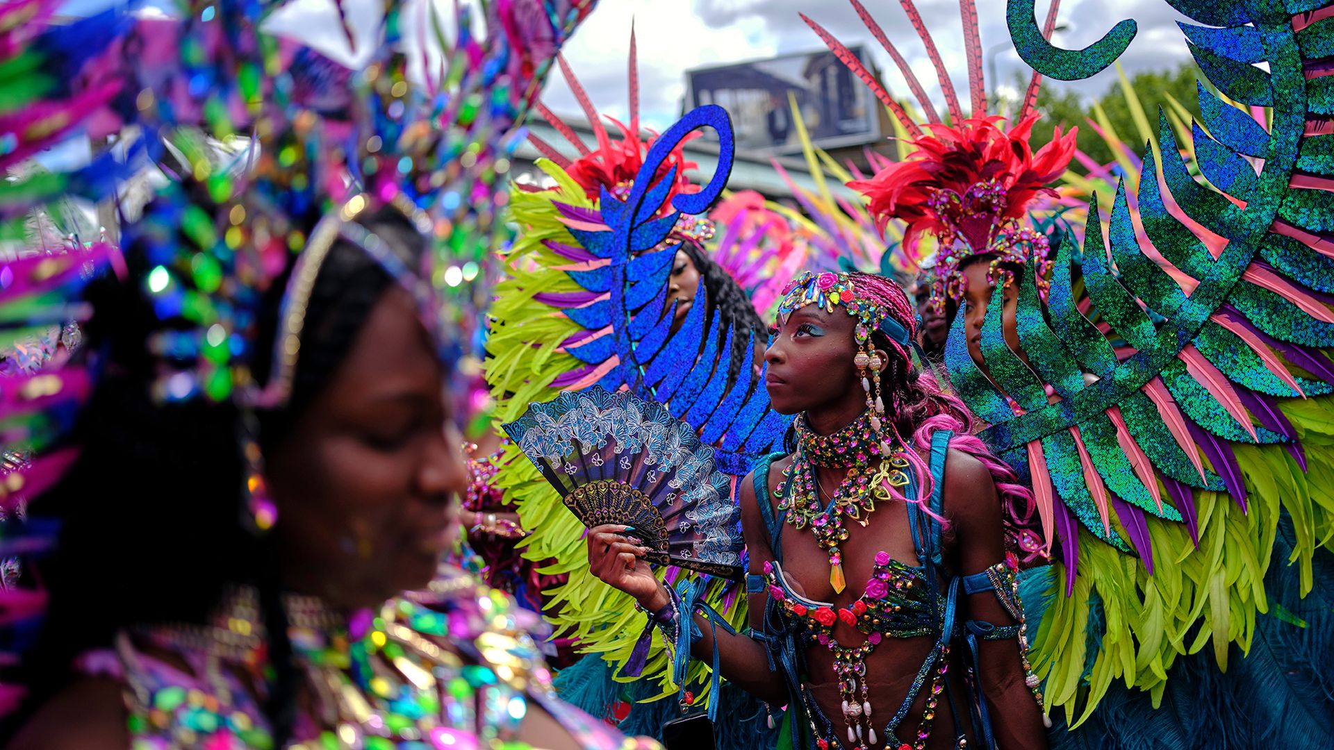 
                                Costumed revelers celebrate the Notting Hill Carnival in London, United Kingdom
                            