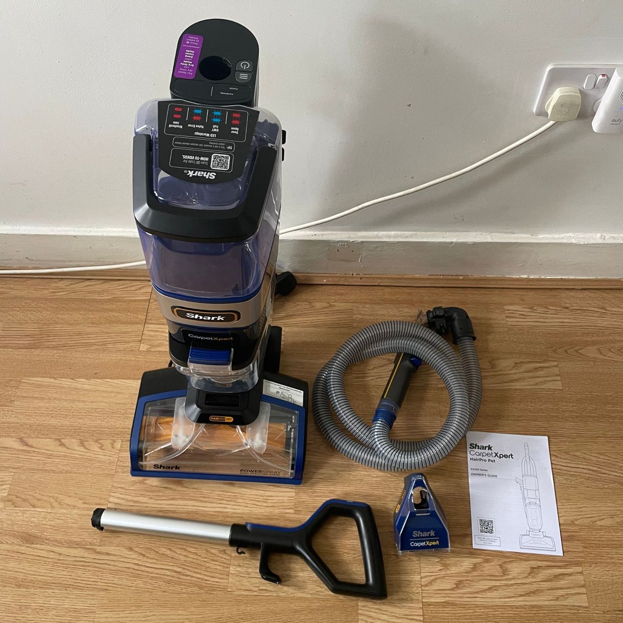 Shark CarpetXpert HairPro Pet Deep Carpet Cleaner with Spot Cleaner EX250UK and components laid out on laminate flooring