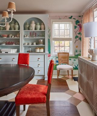 Dining room with a bespoke dressed filled with collectibles and ceramics