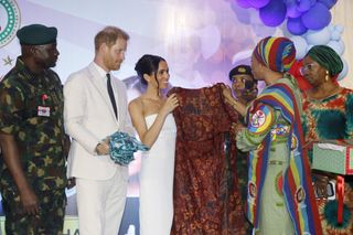 Prince Harry, Duke of Sussex, and Meghan, Duchess of Sussex visit Nigeria Unconquered, a charity organisation that works in collaboration with the Invictus Games Foundation, at a reception at Officers’ Mess on May 11, 2024 in Abuja, Nigeria.