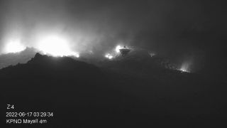 Kitt Peak's Very Long Baseline Array Dish seen in front of the Contreras Fire early on June 17, 2022.