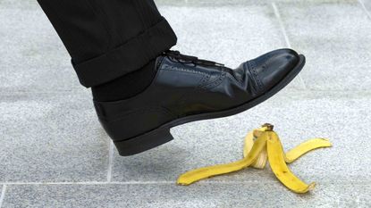 man slipping on banana peel