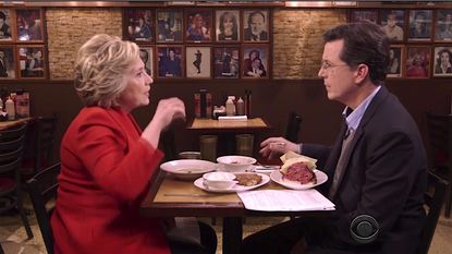 Hillary Clinton and Stephen Colbert eat at Carnegie Deli