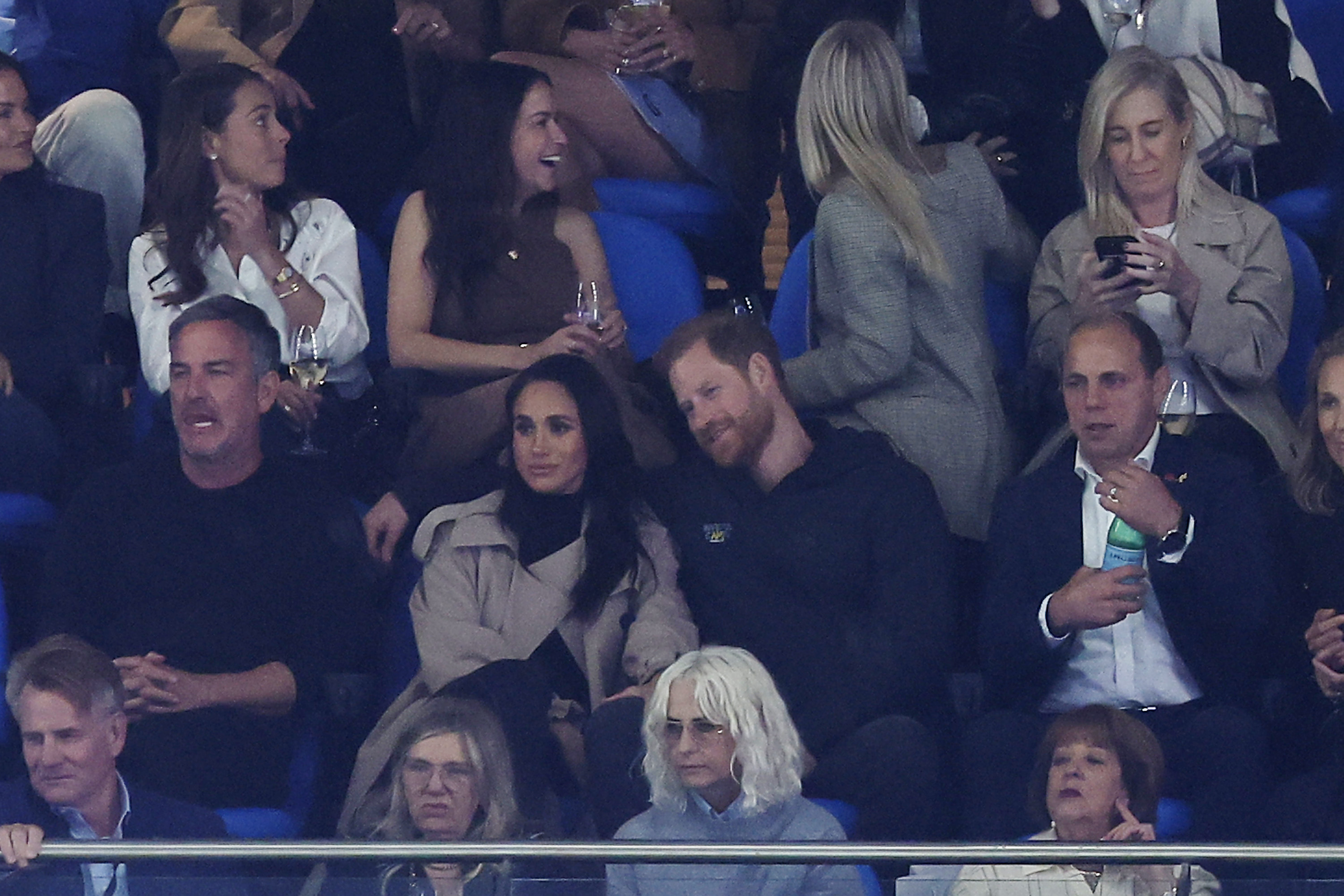 Britain's Prince Harry, Duke of Sussex, and his wife Meghan, Duchess of Sussex, arrive to watch super rugby match between NSW Waratahs and Moana Pasifika at Allianz Stadium in Sydney on April 17, 2026