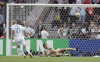 Zinedine Zidane scores a penalty for France against Italy in the 2006 World Cup final in Berlin as Gianluigi Buffon watches the ball on its way in.