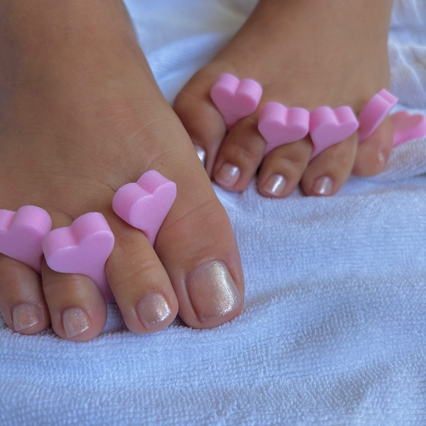 A shimmery neutral pedicure