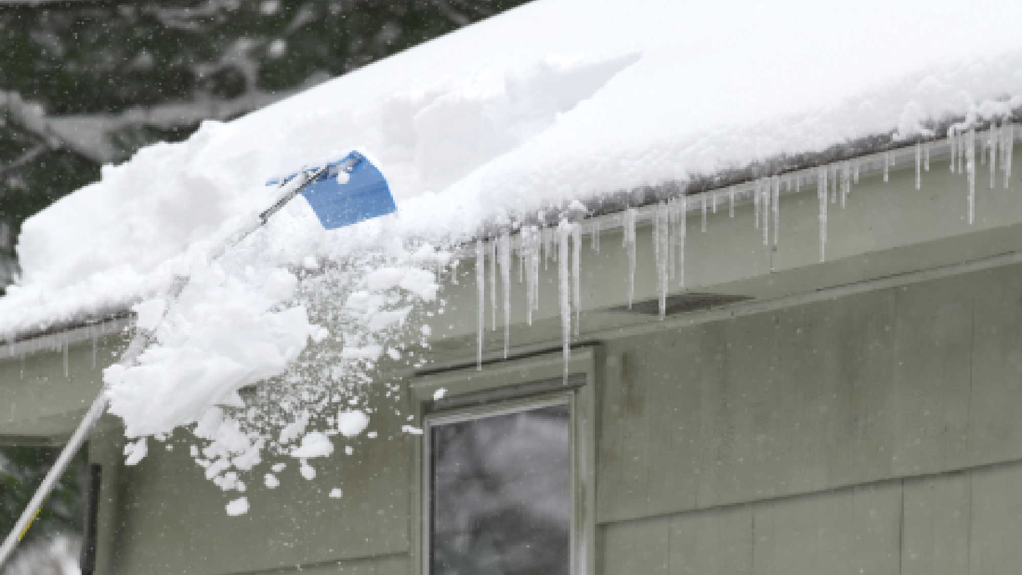 Snow rake on roof