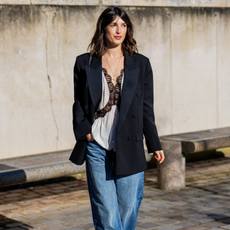 Influencer wearing wide-leg jeans, a lace cami and a blazer