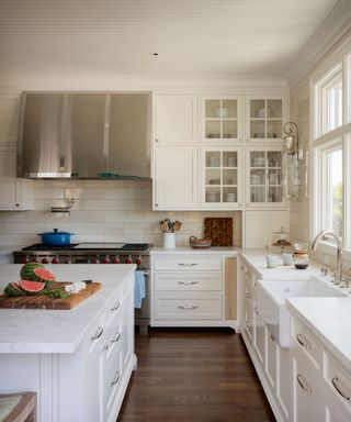 White kitchen in a light filled 1930s home with clever use of pattern