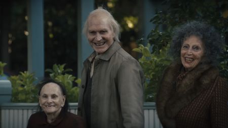 Creepy old people smiling at the camera in Insidious: Out of the Further