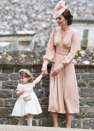 Princess Charlotte of Cambridge, bridesmaid and Catherine, Duchess of Cambridge attend the wedding Of Pippa Middleton and James Matthews at St Mark's Church on May 20, 2017 in Englefield Green, England