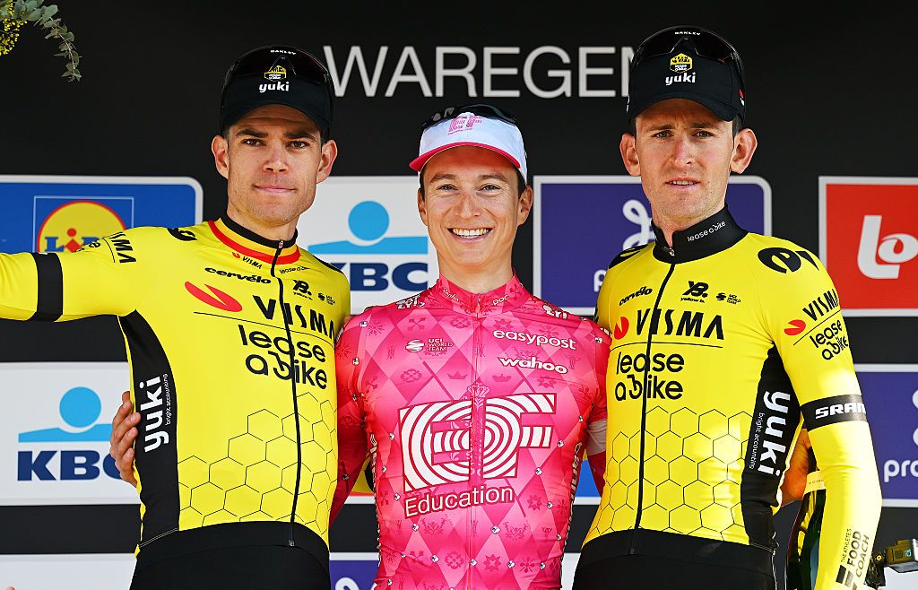 WAREGEM BELGIUM APRIL 02 LR Wout Van Aert of Belgium and Team Visma Lease a Bike on second place race winner Neilson Powless of The United States and Team EF Education EasyPost and Tiesj Benoot of Belgium and Team Visma Lease a Bike on third place pose on the podium ceremony after the 79th Dwars Door Vlaanderen 2025 Mens Elite a 1842km one day race from Roeselare to Waregem UCIWT on April 02 2025 in Waregem Belgium Photo by Tim de WaeleGetty Images