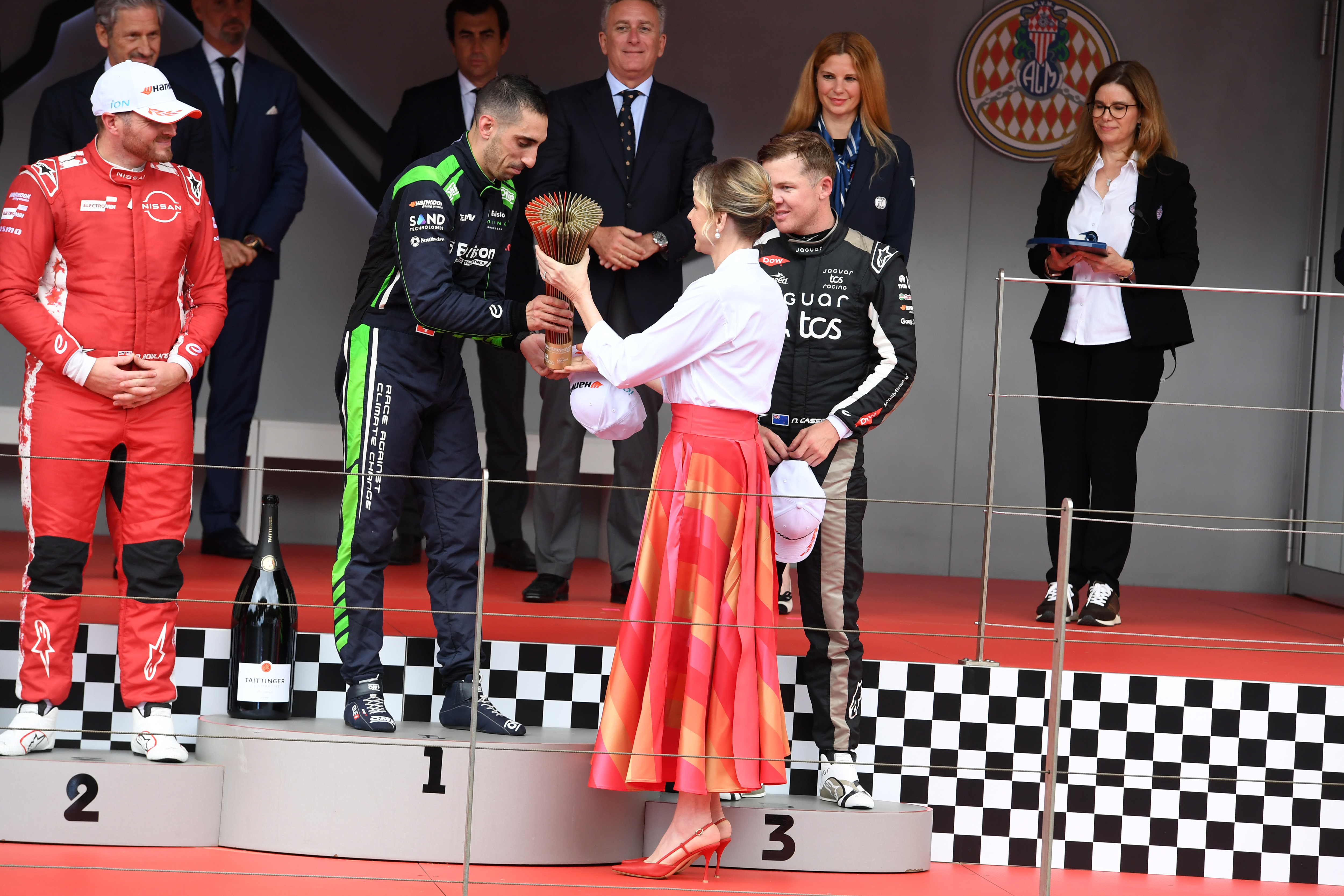 Princess Charlene handing a trophy to Sebastien Buemi