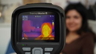 Thermal camera pointing at woman