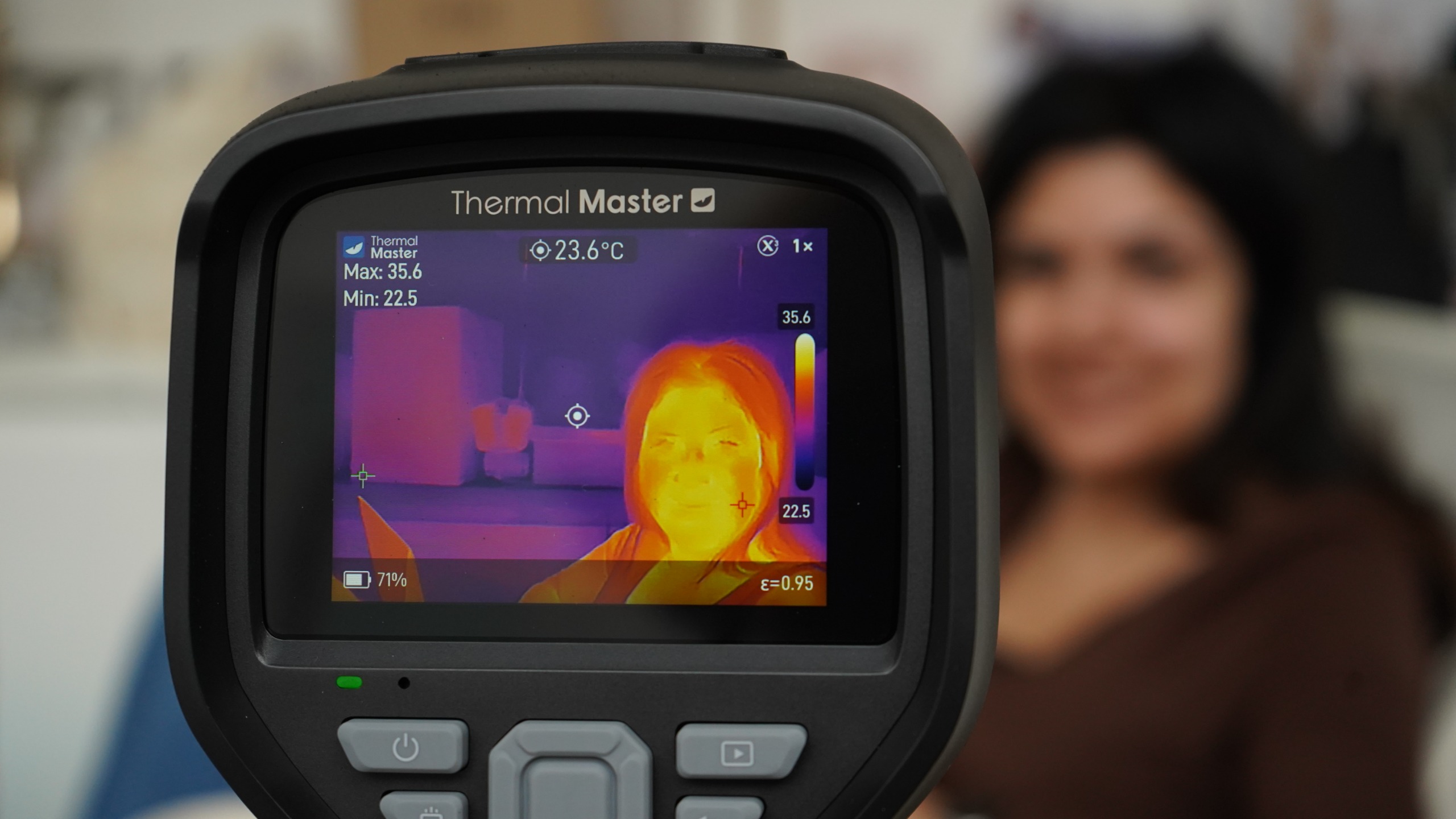 Thermal camera pointing at woman